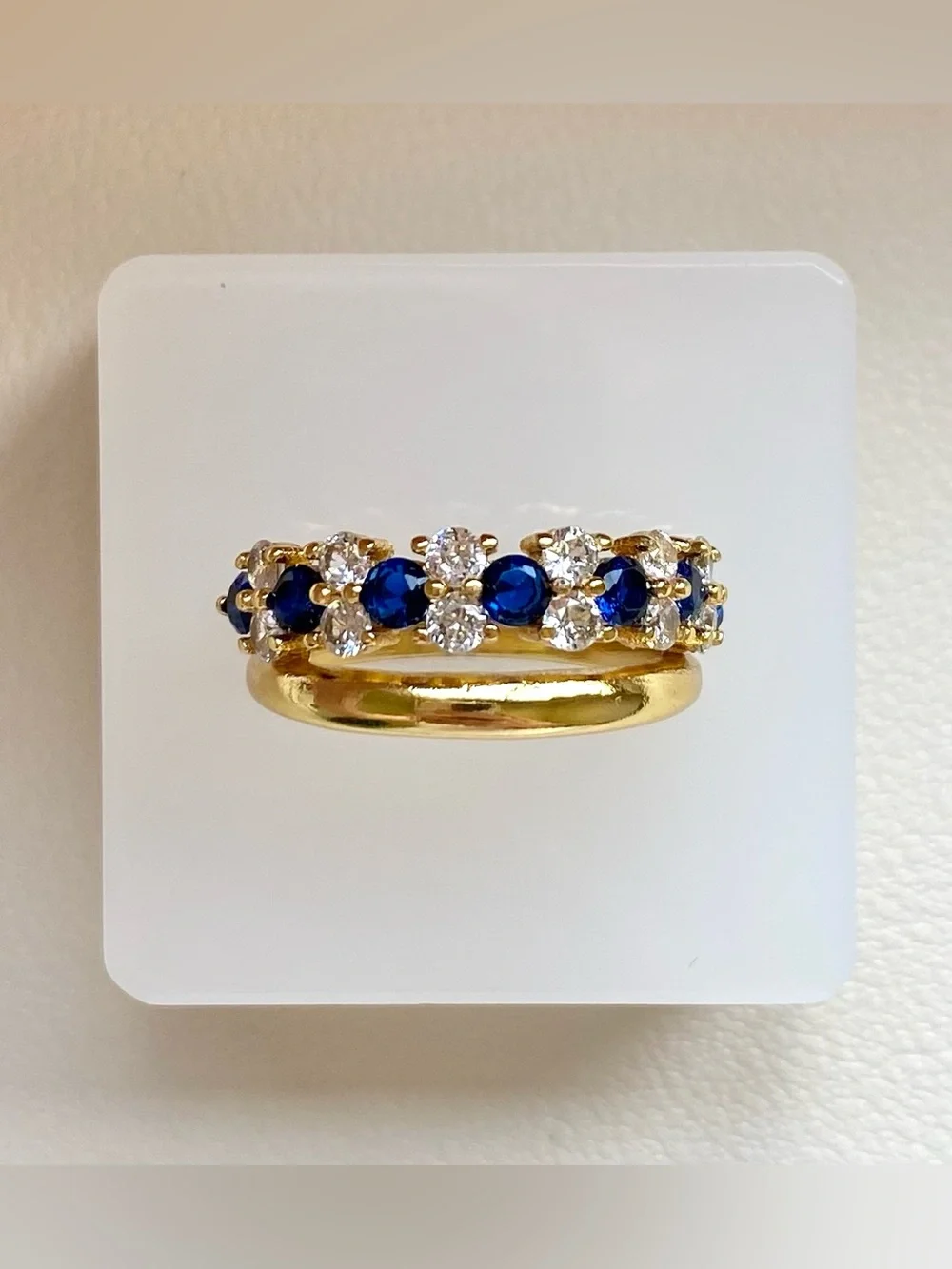 Gold Band Ring with Blue Sapphire and White CZ Accents